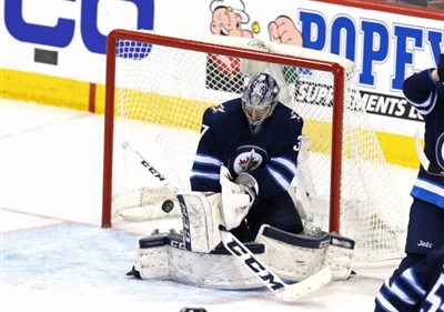 Connor Hellebuyck Poster 3530912