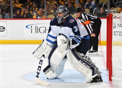 Connor Hellebuyck Poster 3530956